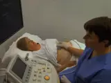 nurse conducting a gastrointestinal tract ultrasound