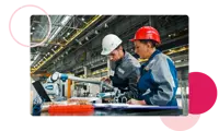 Two workers on an assembly line