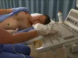 Nurse administering the Doppler technique